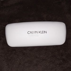 Calvin Klein sun glasses case.